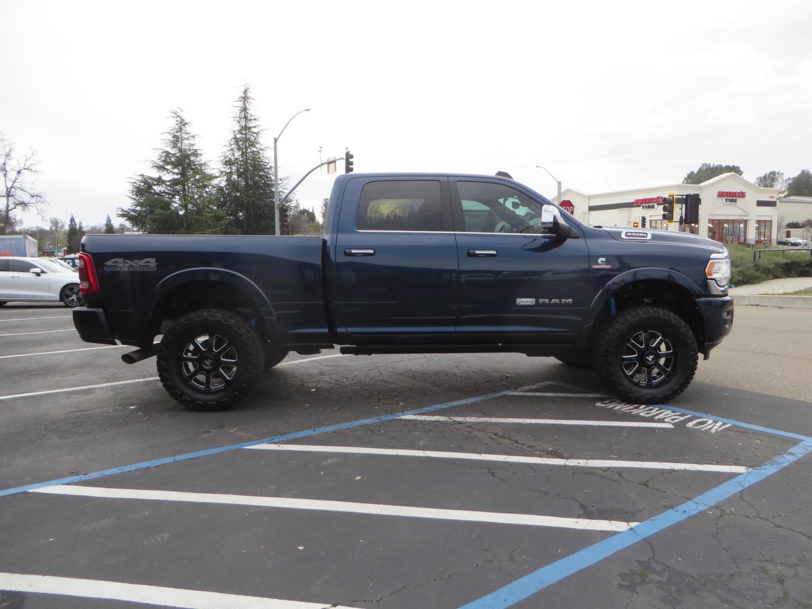 2022 BLUE /BROWN RAM 2500 Limited Longhorn Crew Cab SWB 4WD (3C6UR5GL7NG) with an 6.7L L6 OHV 24V TURBO DIESEL engine, 6A transmission, located at 2630 Grass Valley Highway, Auburn, CA, 95603, (530) 508-5100, 38.937893, -121.095482 - Beautiful Ram Limited Longhorn with a level kit, 20" Fittipaldi wheels, Toyo Open Country RT Trail tires, and a Demco 18K sliding 5th wheel hitch. - Photo #3